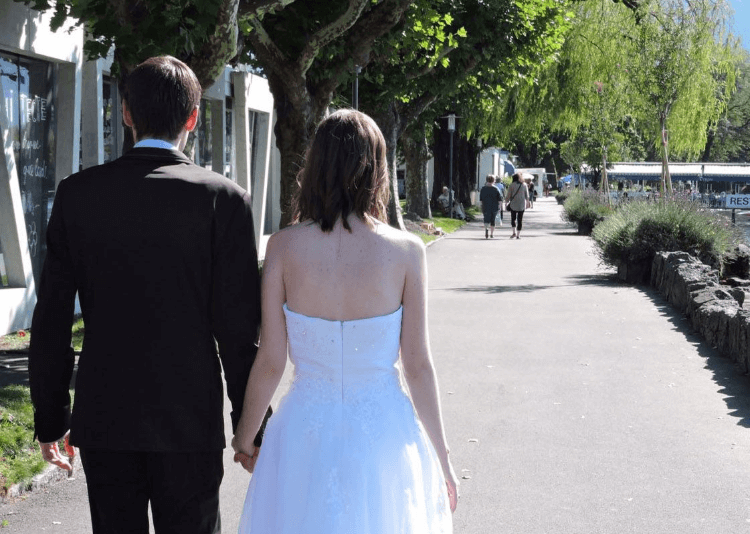 Strapless wedding dresses and black suit are perfect choice for wedding
