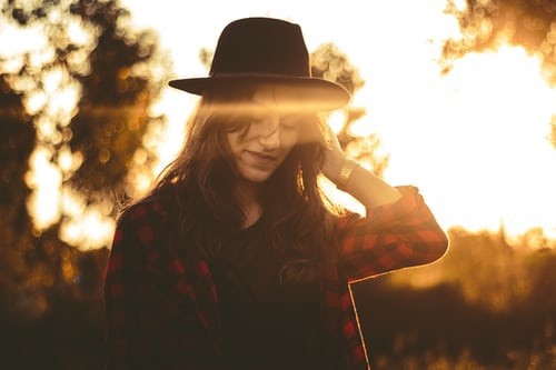 The Girl is Standing in The Sun