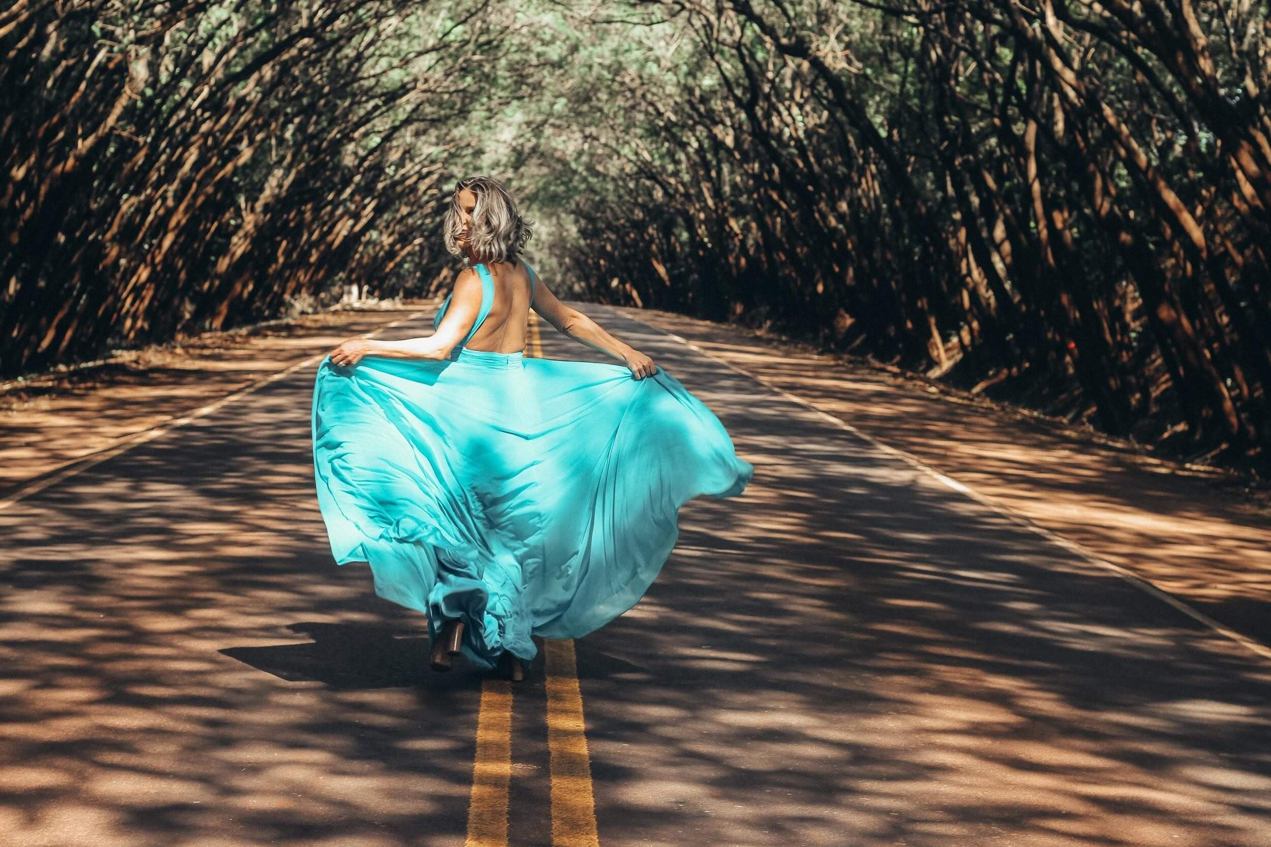 Woman in an evening dress running