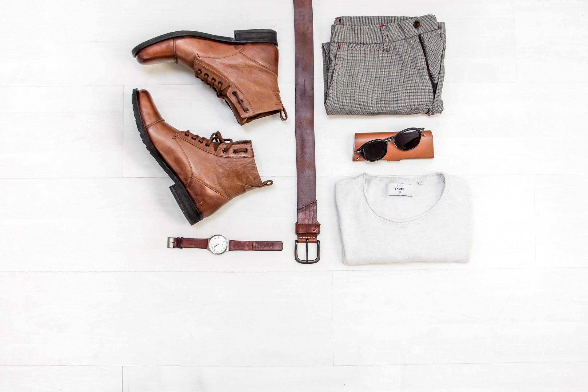 Flatlay of men's accessories and clothes